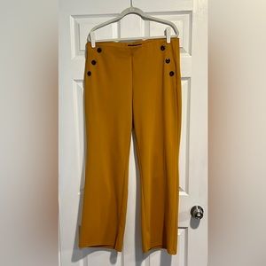 Yellow pants with Black button details